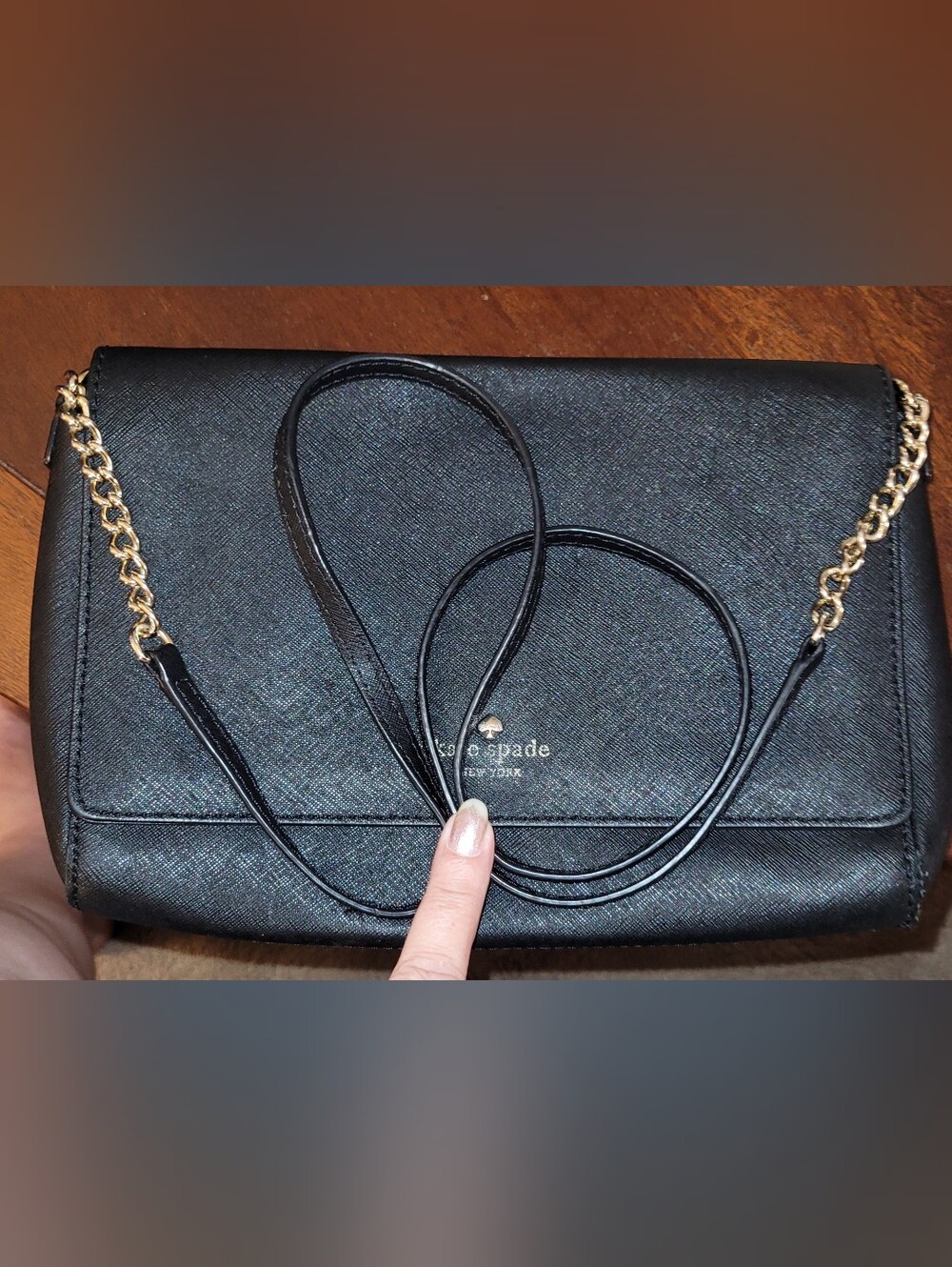 Kate Spade, black leather shoulder bag.